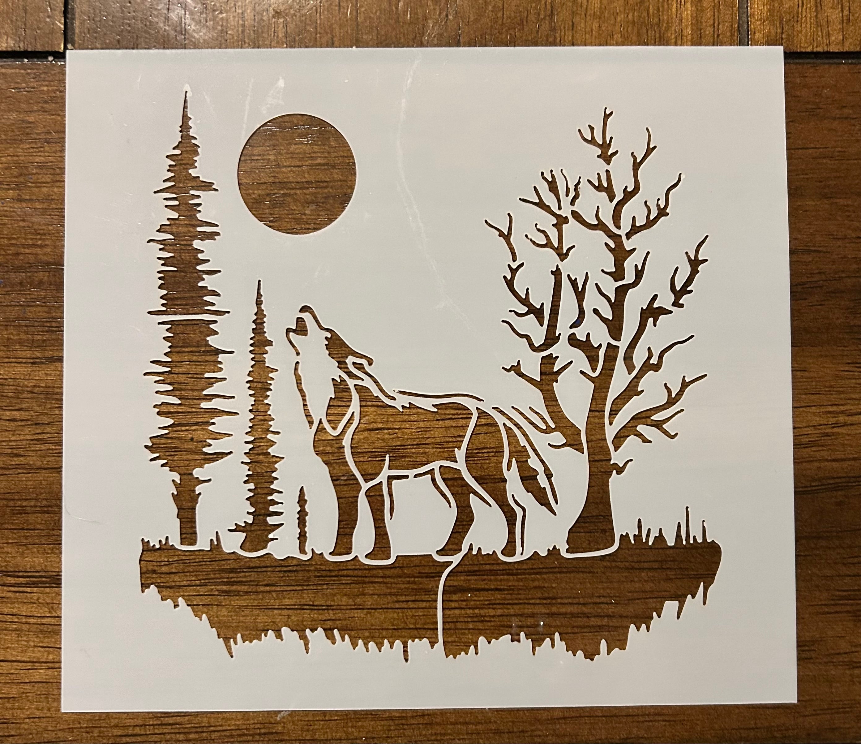 Howling at the moon wolf stencil