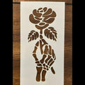 Skelton and  hand with 
rose stencil