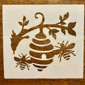 Bee and beehive on a limb stencil