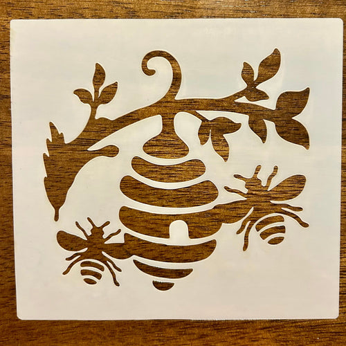 Bee and beehive on a limb stencil